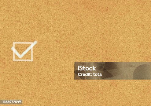 istock Illustration of a white check mark on a cork board 1366972049