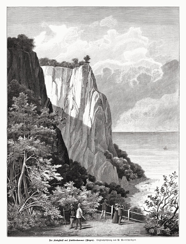The Königsstuhl (King's Chair), best-known chalk cliff at the arial of Stubbenkammer in the Jasmund National Park at the Baltic Sea island of Rügen, Germany. Wood engraving after a drawing by Wilhelm Wollschlaeger from the book 