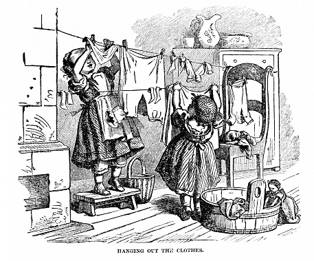 Two sisters hang laundry on a clothesline inside the house. A doll is propped over the washtub.  Series. Part 2 of 2. Illustration published 1890. Source: Original edition is from my own archives. Copyright has expired and is in Public Domain.