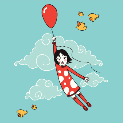 Little girl flying with a balloon