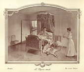 istock Maid bringing a young woman breakfast in bed, Victorian 19th Century 1364927851