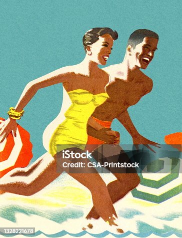 istock Man and Woman Running in Water on the Beach 1328221678