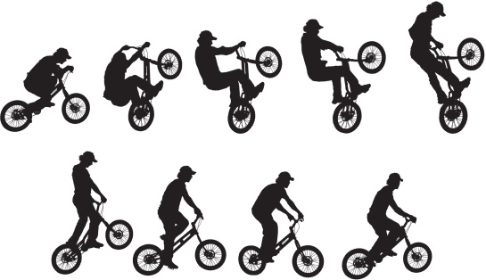 Man performing stunt on BMX bike