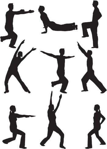 Men and women holding yoga poses