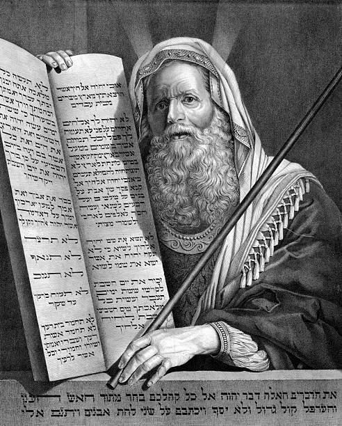 Moses and the Ten Commandments A vintage engraving featuring Moses and the Ten Commandments. synagogue stock illustrations