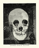 istock Optical illusion, Two children and dog, form a skull shape, Victorian 1298406887