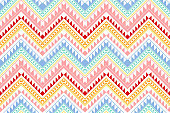 istock pastel colorful vintage zigzag ethnic geometric oriental seamless traditional pattern. design for background, carpet, wallpaper backdrop, clothing, wrapping, batik, fabric. embroidery style. 1343448388