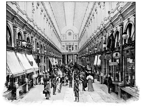 People shopping in King's Gallery at the Galeries Royales Saint-Hubert in Brussels, Belgium. Vintage halftone etching circa 19th century.