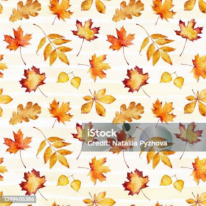 istock Seamless pattern with watercolor autumn leaves on light striped background. 1399405386