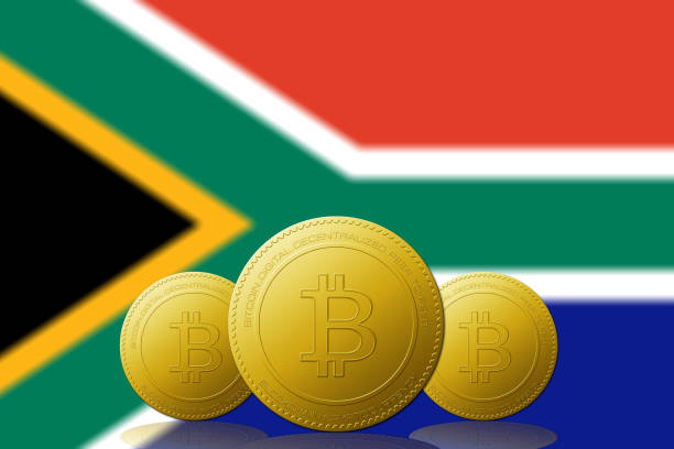 Three Bitcoins crypto with South Africa flag on background. 