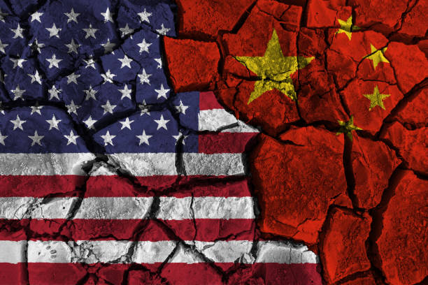 Trade war between United states of america VS China . flag on cracked wall background . Confliction and crisis concept .  china stock illustrations
