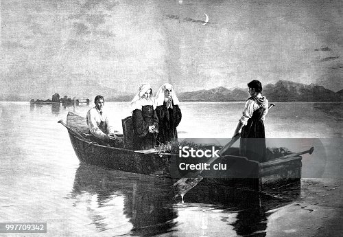 istock Two nuns in a boat getting rowed to the monastery 997709342