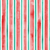 istock Watercolor red and green lines on white background. Colorful striped seamless pattern 1358319430