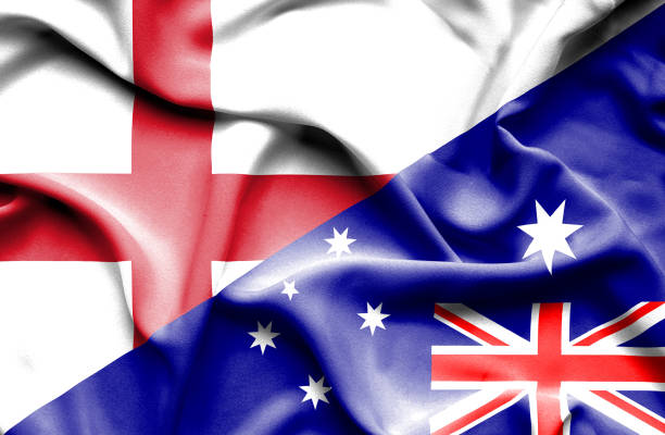 machając flagą australii i anglii - england australia stock illustrations
