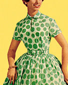 istock Woman in Green Polka Dot Dress 186573888