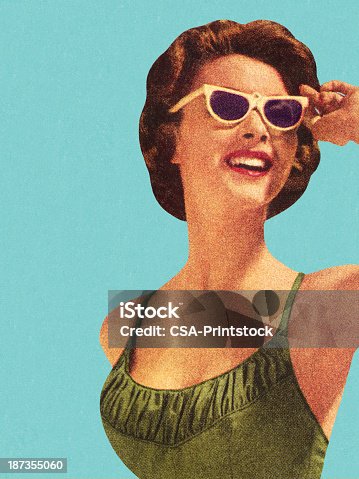 istock Woman Wearing Sunglasses and Green Swimsuit 187355060