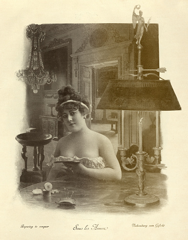 Vintage illustration after a photograph of Young woman putting on make up, Preparing to conquer, 19th Century