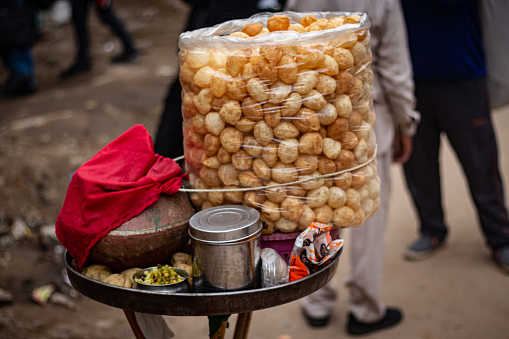 Shows Golegappe, a very loved street food in Delhi.