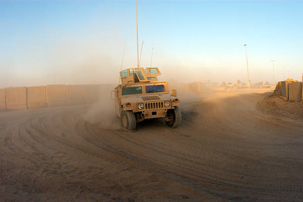 HMMWV View of Armored HMMWV in Iraq. military land vehicle stock pictures, royalty-free photos & images