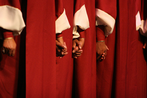 Hands of a choir.