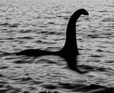 Loch Ness Monster sighting!! The water is from one of my other images. Added noise and blur to make it look like the famous old hoax picture.