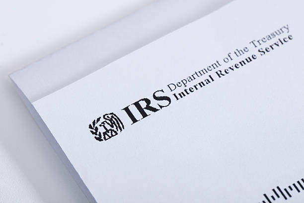 IRS Las Vegas, USA - January 19, 2016: A letter from the Internal Revenue Service or IRS. Photographed with a macro lens.  irs stock pictures, royalty-free photos & images