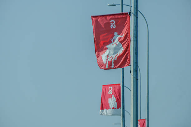 12uly 2021 - Calgary Alberta Canada - Calgary Stampede Flags flying in the wind stock photo