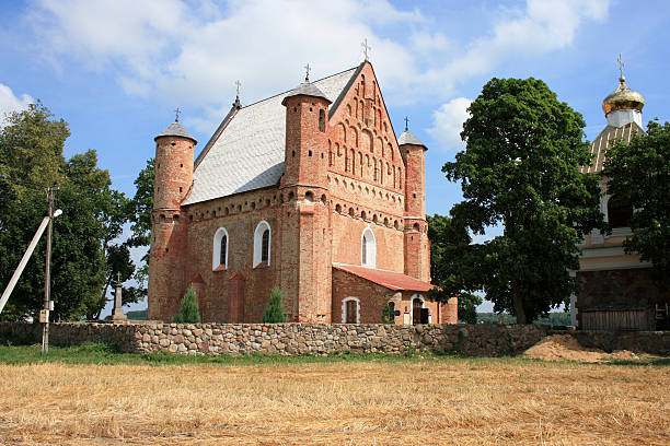 16th century fortified church in Belarus village stock photo