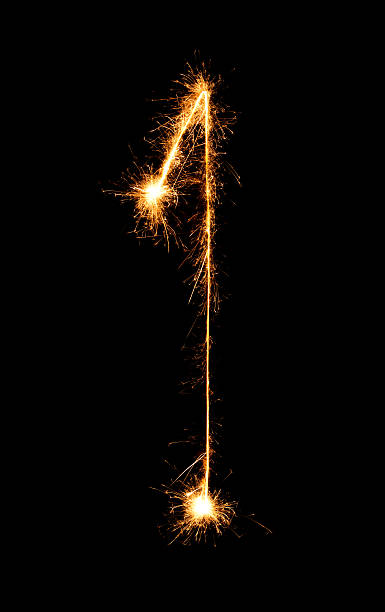 1digit-one-made-of-firework-sparklers-at-night-picture-id502354022