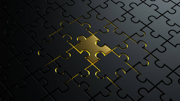 3d illustration of puzzle pieces background texture with a golden colored one in center stock photo