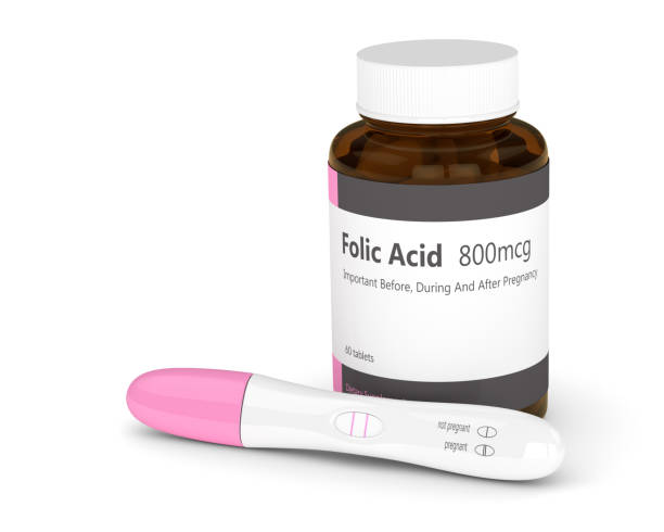 3d render of folic acid pills and pregnancy test 3d render of folic acid pills and pregnancy test isolated over white background folic acid stock pictures, royalty-free photos & images