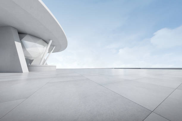 3d render of futuristic architecture with empty concrete car park. stock photo