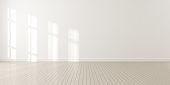 istock 3d render of modern empty room with wooden floor and large white plain wall. 1301739174