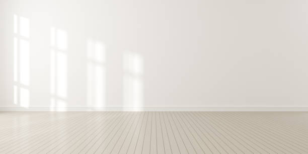 3d render of modern empty room with wooden floor and large white plain wall. stock photo