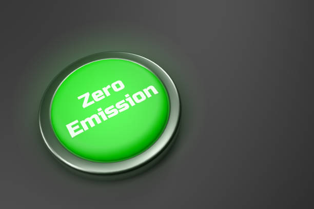 representación en 3d de un botón verde brillante aislado sobre fondo gris. - zero emissions fotografías e imágenes de stock