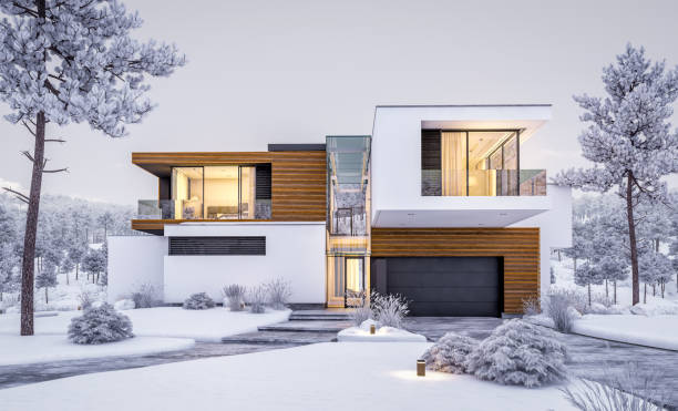 3d rendering of modern cozy house by the river in winter evening stock photo