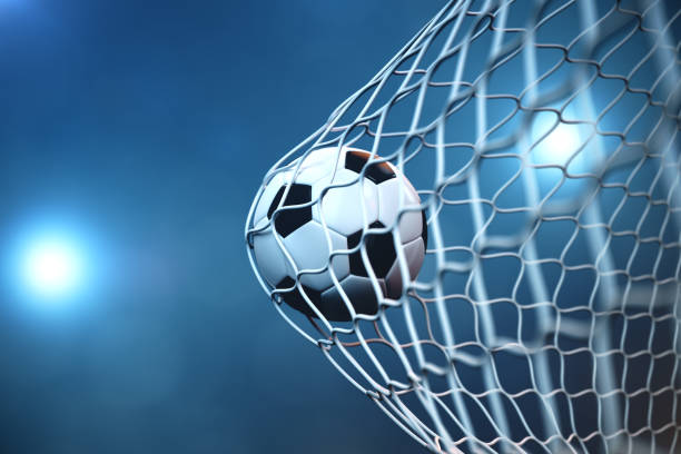 3d rendering palla da calcio in porta. pallone da calcio in rete con faretto o sfondo luce stadio, concetto di successo - sphere flying foto e immagini stock