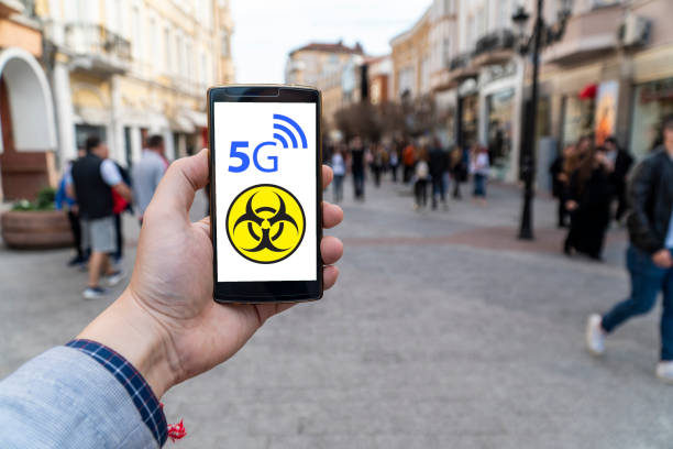 5g network danger displayed outdoors stock photo