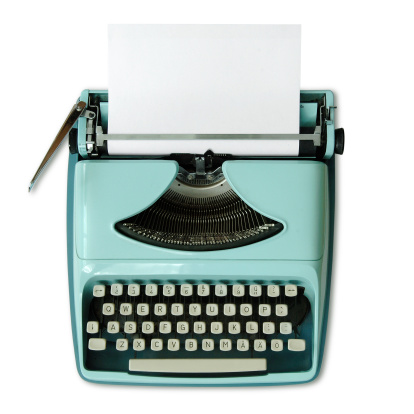 Old typewriter with swedish keyboard isolated against white background