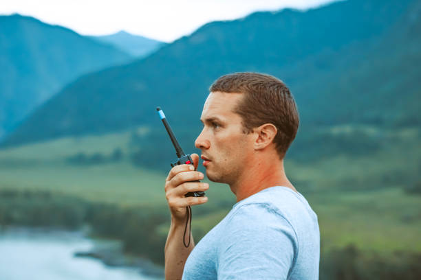 a man talking on the radio stock photo