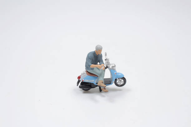 a mini Man Sit On Custom Motorbike. stock photo