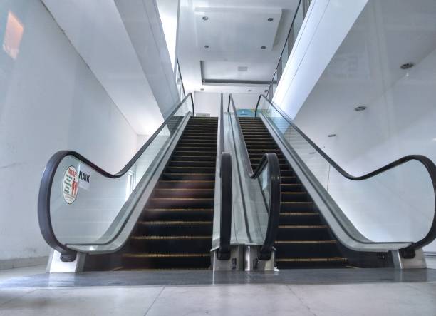 a pair of escalators stock photo