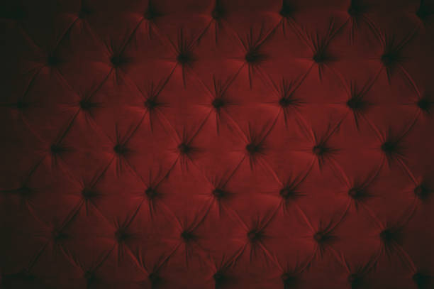 a red velvet texture Dark red velvet pillow with buttons cushion photos stock pictures, royalty-free photos & images