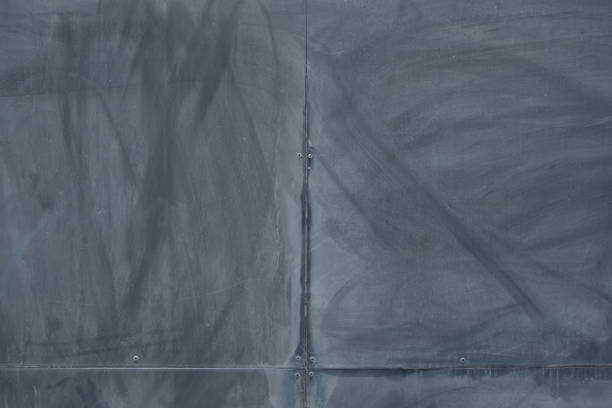 Abstract Background Grunge, Weathered Metal Panel Black Color, Art backdrop. stock photo
