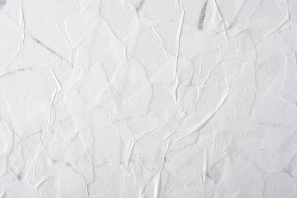 Abstract background of white crumpled paper. stock photo