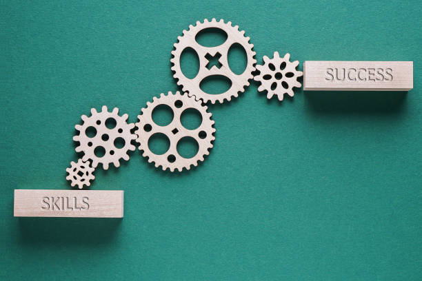 Abstract background with connected gears working together, from skills to success. Creative development process. stock photo