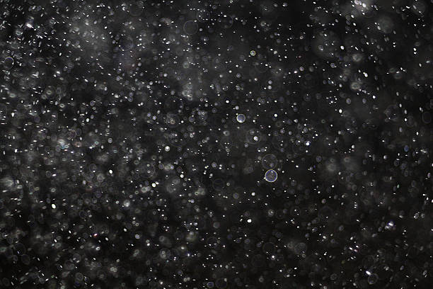 Abstract black white snow texture on black background for overlay stock photo