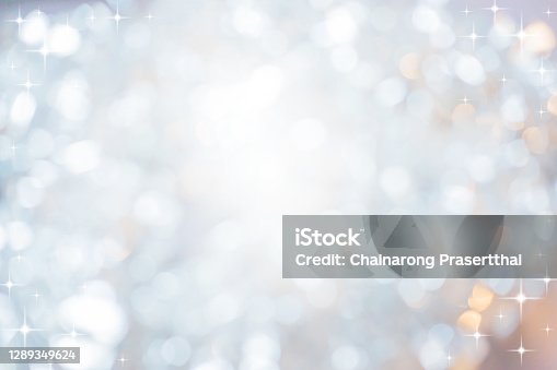 istock abstract blur beautiful glowing colorful color background with circle bokeh light and shining star glittering for christmas festival and happy new year season design as banner concept 1289349624