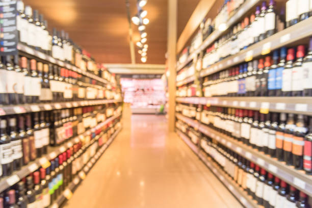Abstract blurred image of liquor shop for background uses stock photo