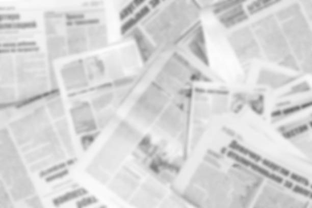 Abstract blurred image of old newspapers. Media news concept. stock photo